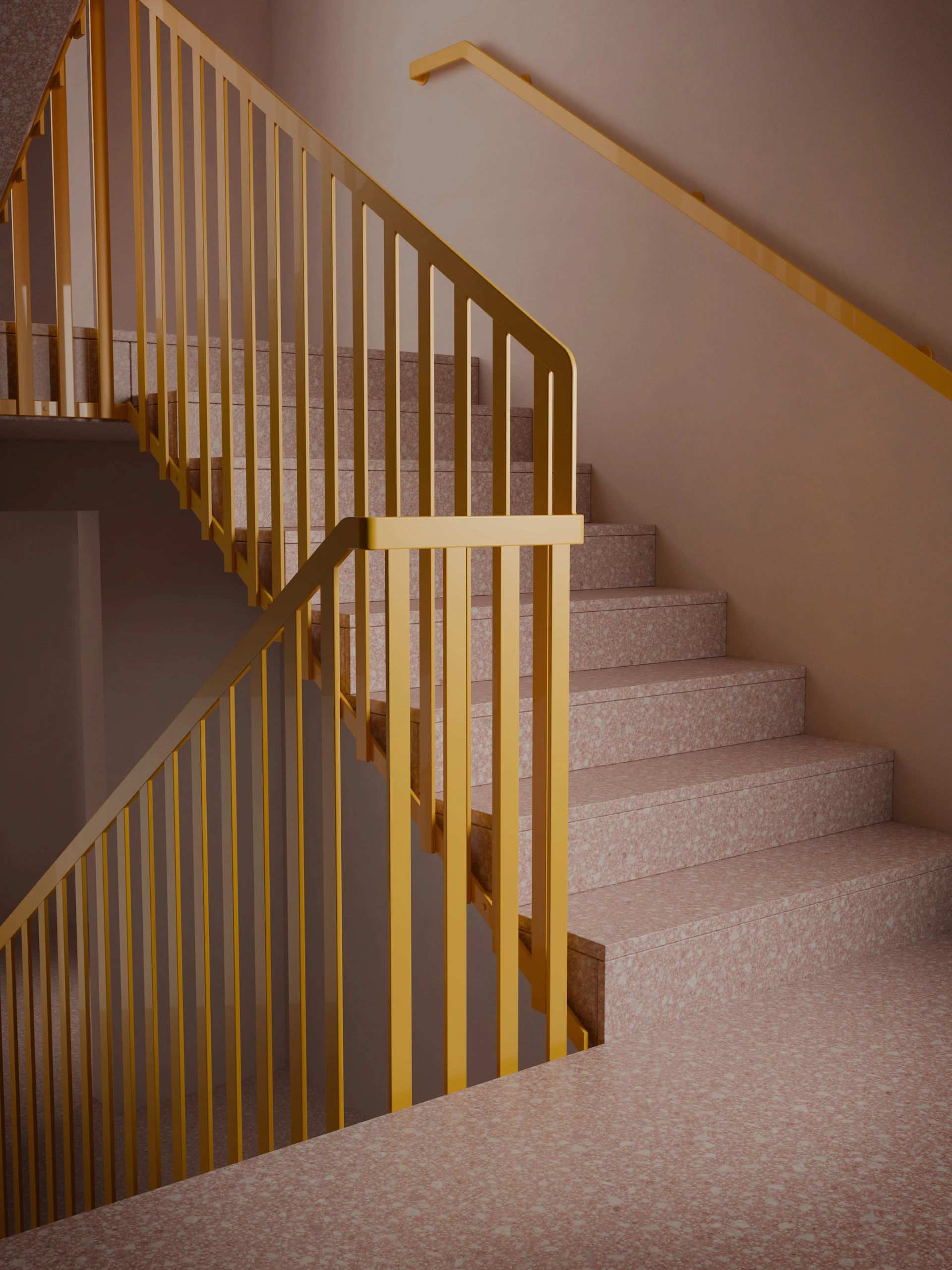 Trappa i rosa terrazzo med guldfärgade metallräcken och handledare